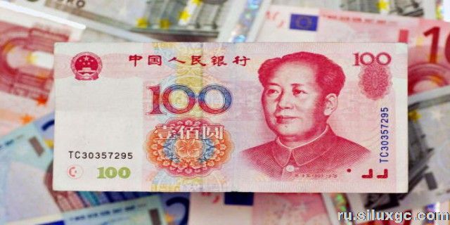 Курс китайского юаня снизился до 6,8985 за доллар