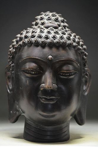 В Китай возвращена украденная 1500-летняя голова статуи